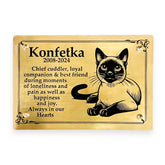 Custom Brass Pet Memorial Plaque for a cat named Konfetka with text and a black and white cat illustration on a gold background.