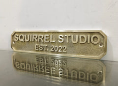 Brass door sign with custom engraved text and date