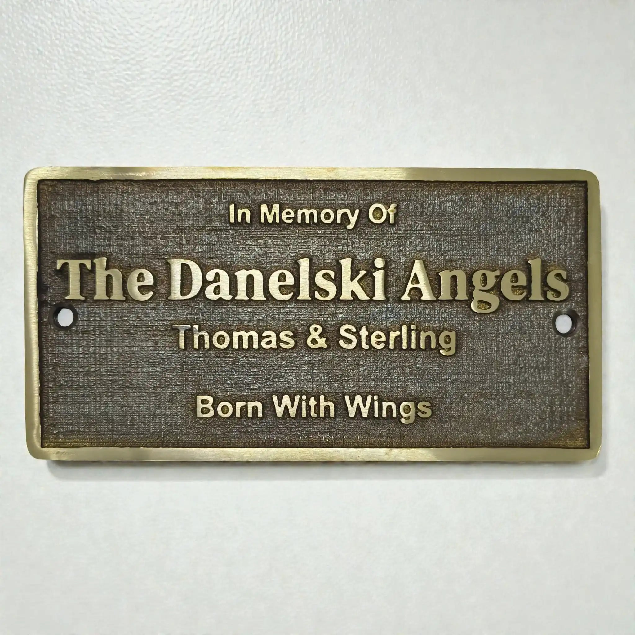 Memorial bench plaque with raised 3D lettering