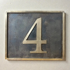 Custom bronze address plaque with antique finish and raised numerals