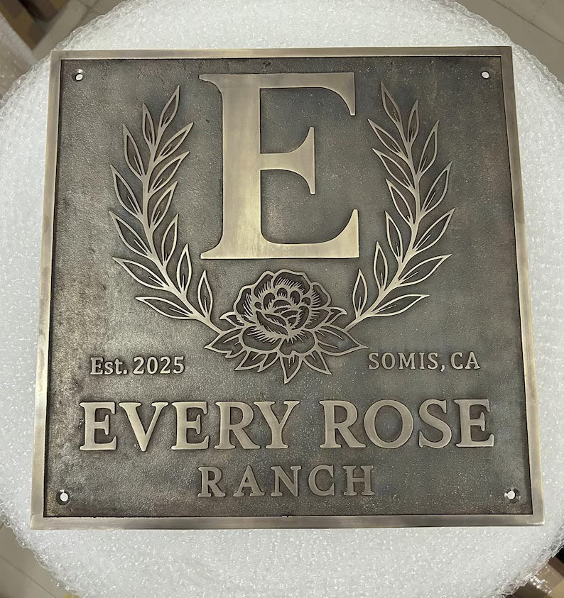 Custom Bronze Plaques - Address Plaques with 'E' and floral design, featuring 'Every Rose Ranch' text.