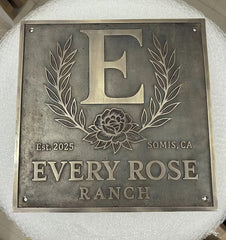 Custom Bronze Plaques - Address Plaques with 'E' and floral design, featuring 'Every Rose Ranch' text.