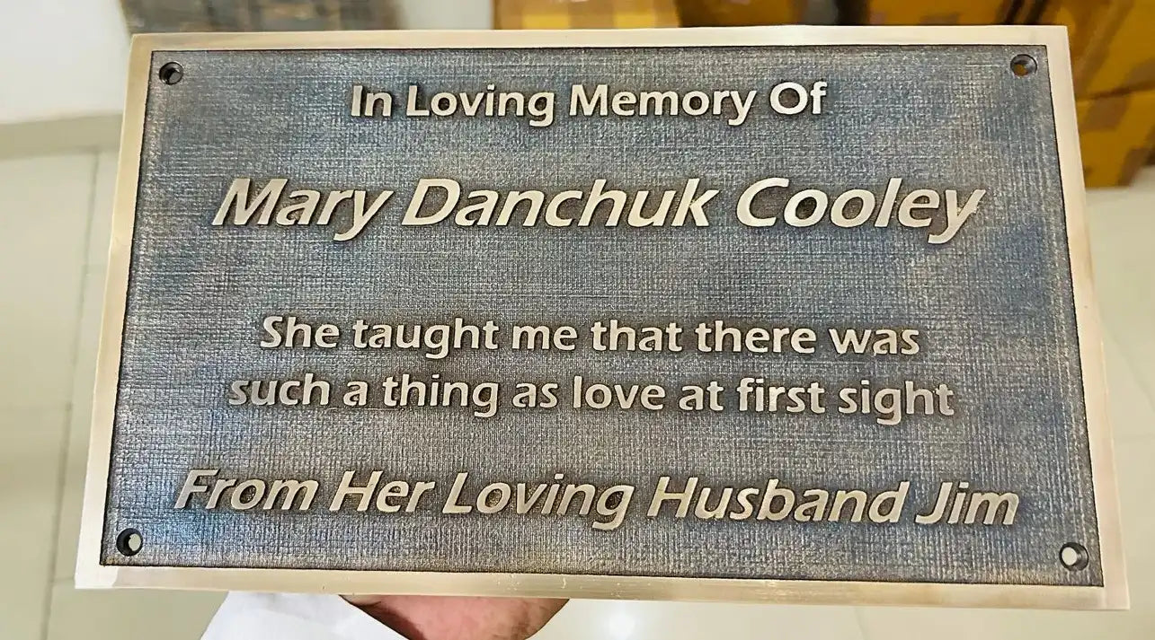 Memorial plaque for Mary Danchuk Cooley with a quote from her husband Jim.