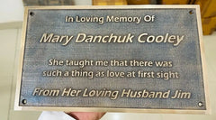 Memorial plaque for Mary Danchuk Cooley with a quote from her husband Jim.