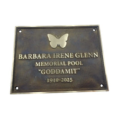 Memorial plaque for Barbara Irene Glenn with a butterfly emblem on a white background
