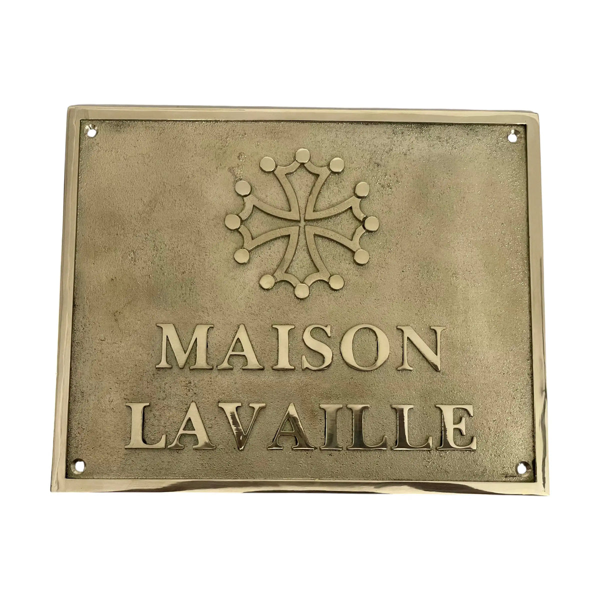 Brass plaque with 'MAISON LAVAILLE' and a decorative emblem on a white background