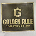 Bronze Metal sign with 'Golden Rule Construction' logo and text on a white background