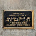 National register of historic place bronze plaque - Plaque on a concrete wall indicating listing in the National Register of Historic Places.
