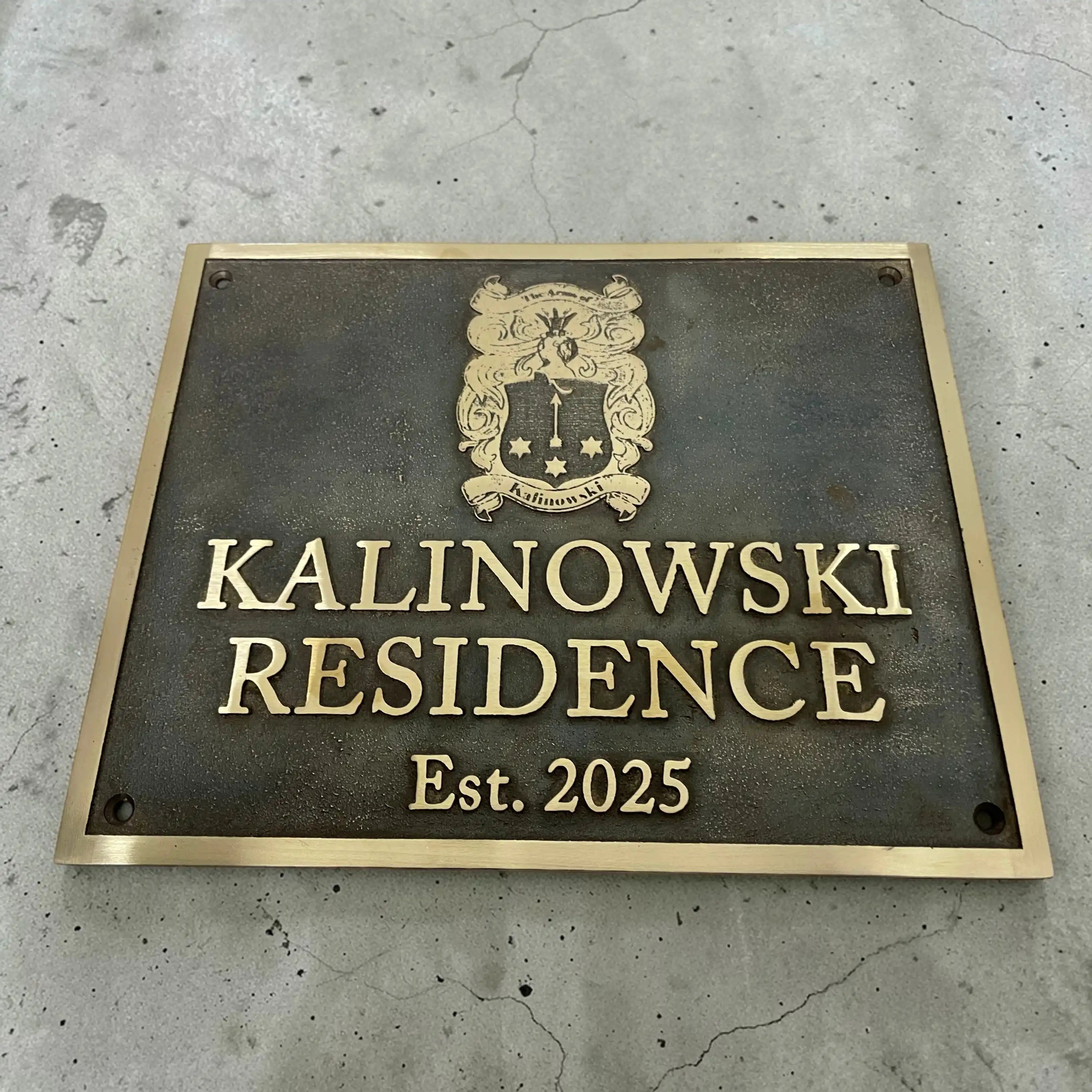Address Plaque with 'Kalinowski Residence Est. 2025' on a concrete wall