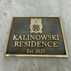 Address Plaque with 'Kalinowski Residence Est. 2025' on a concrete wall
