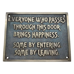 Custom bronze sign with motivational quote on a white background
