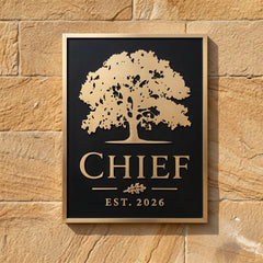 Bronze plaque address sign with tree design and 'CHIEF EST. 2026' text on a stone wall.