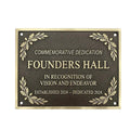 Plaque commemorating Founders Hall with decorative elements on a white background