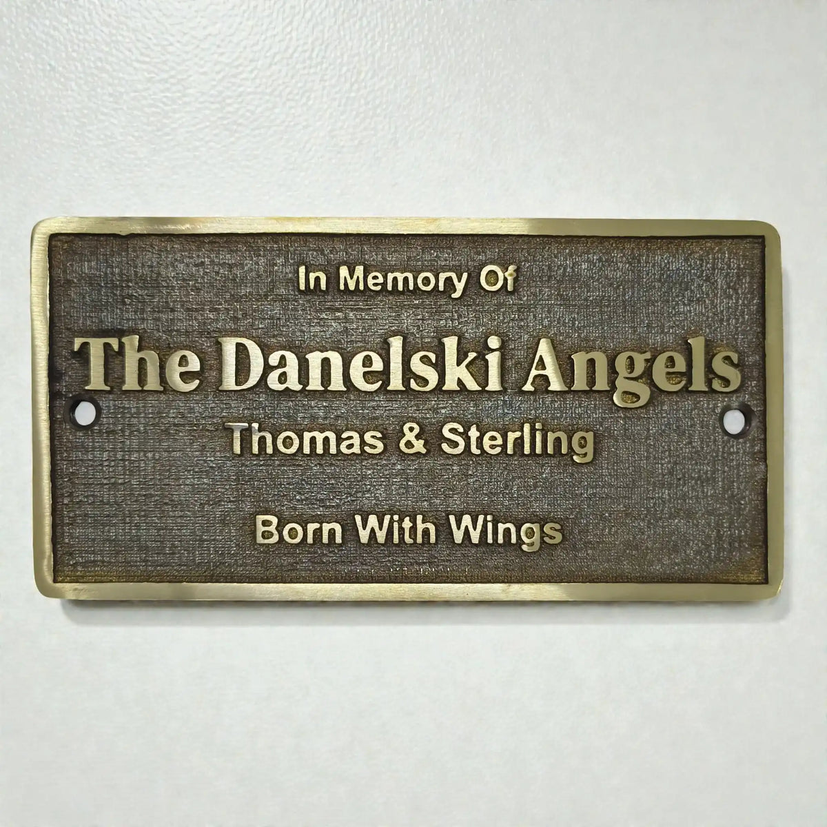 Memorial bench plaque with raised 3D lettering