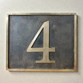 Custom bronze address plaque with antique finish and raised numerals